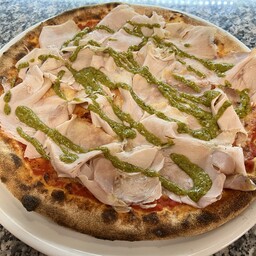 Porchetta trevigiana, gorgonzola, pesto genovese.