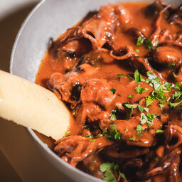 Moscardini alla Luciana in umido con polenta