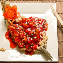 Branzino in salsa agropiccante con i pinoli