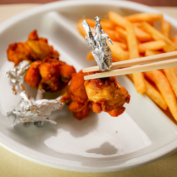 Cosia di pollo croccante con patate fritte