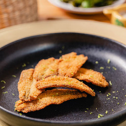 Boquerones fritos y ralladura de lime